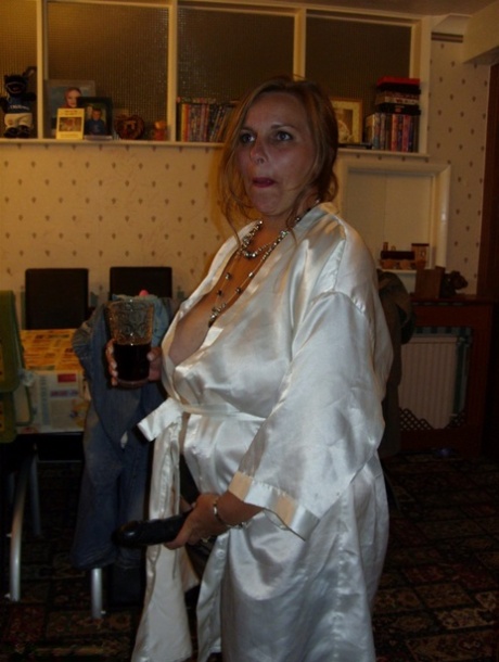 Fat old women use a strapon cock during the course of a threesome 19879267